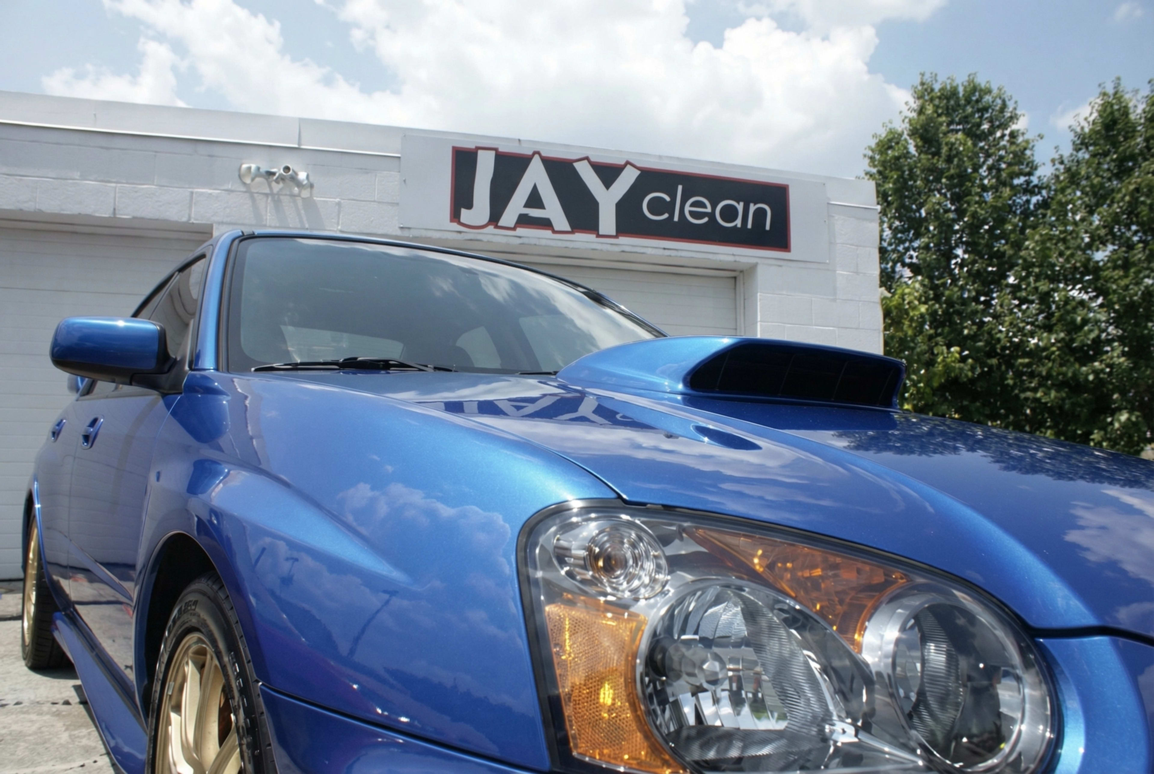 Blue Subaru receiving paint correction prep work at JayClean in Stow Ohio
