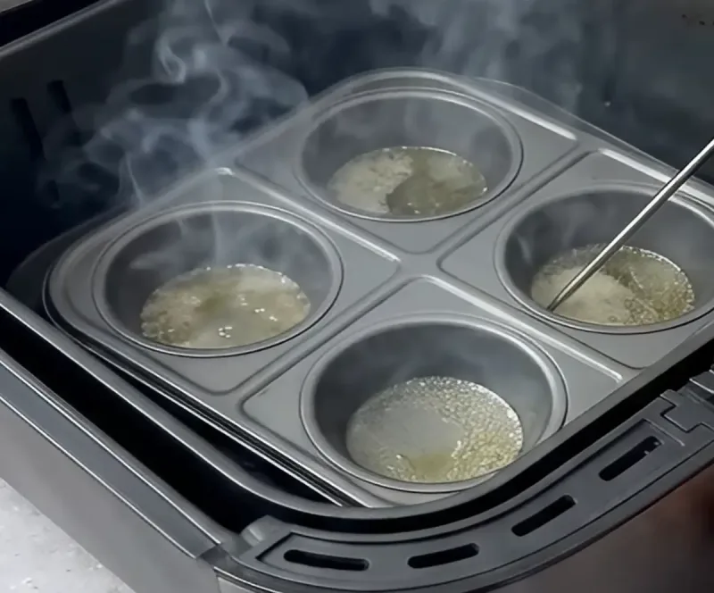 Preheat tin with fat until smoking