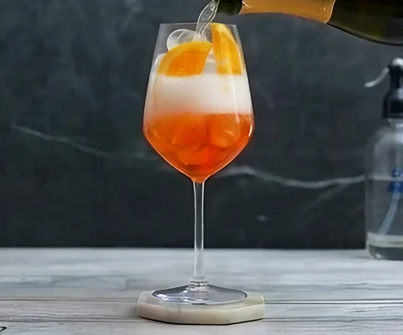 Layer in the correct order: Prosecco first