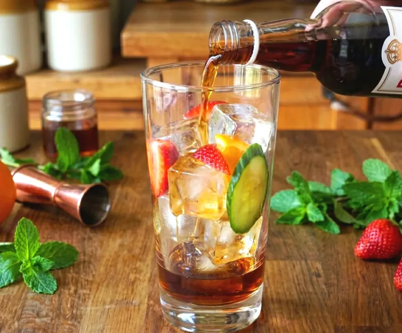 Pour the Pimm's, then build with fruit