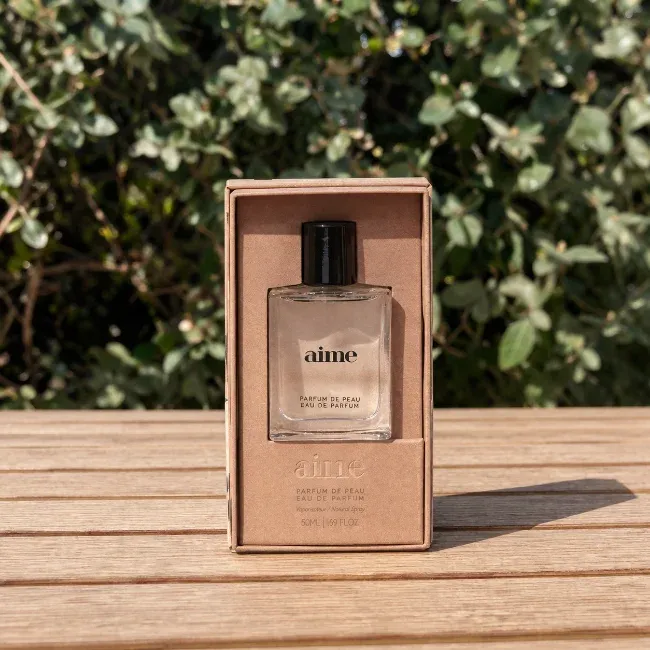 Le packaging de l'eau de parfum de peau Aime