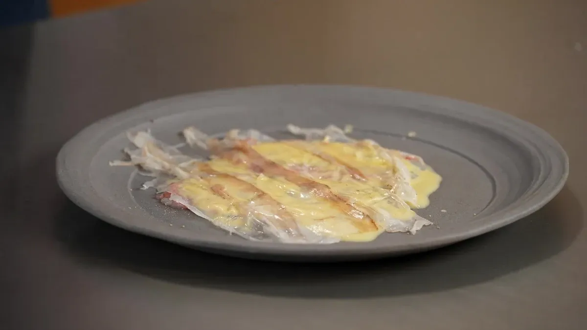 Carpaccio de langoustine, beurre blanc et lard de Colonata