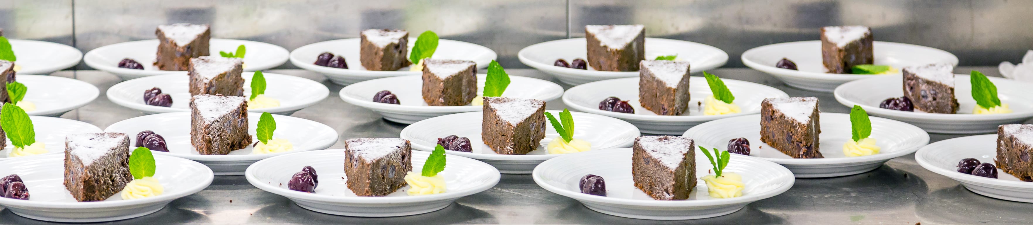 Many desserts on a prep table