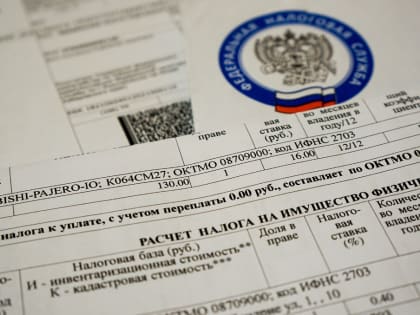 Обязанность по уплате имущественных налогов за несовершеннолетних возложена на их законных представителей