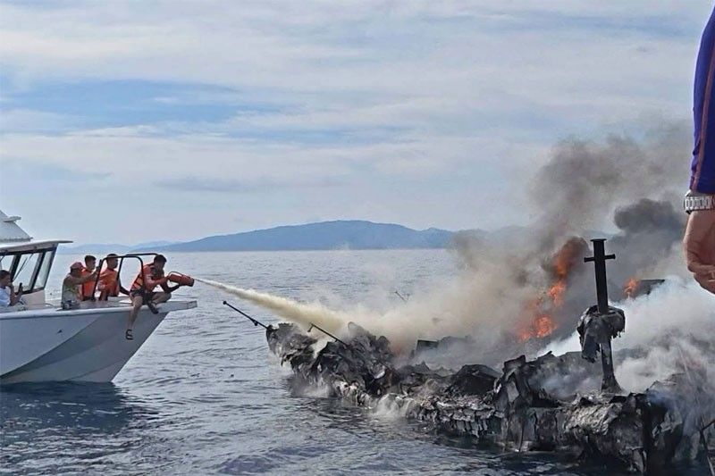 Philippine Coast Guard and Fishermen Rescue Crew from Burning Yacht