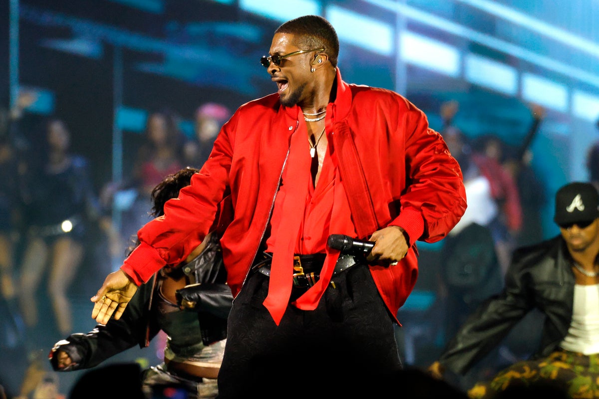 Usher Halts Uncomfortable On-Stage Interaction with Fan During Nashville Performance