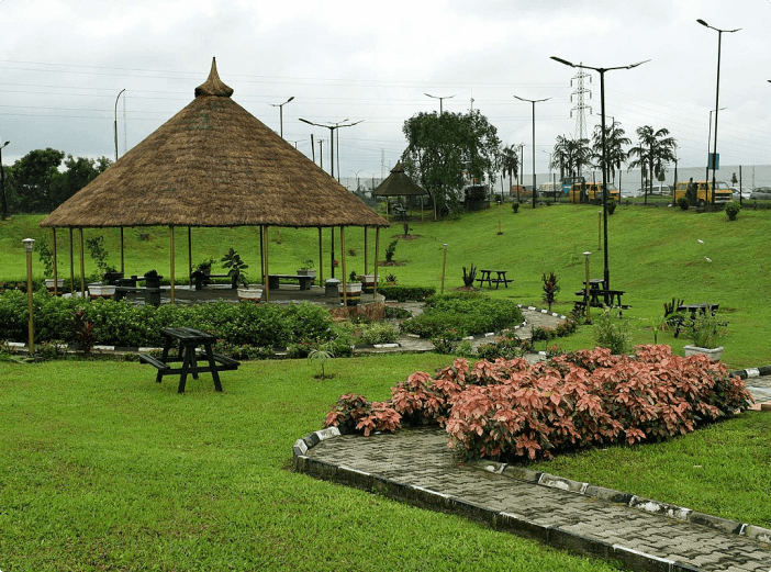 Thatched gazebo and gardens at MKO Abiola Garden
