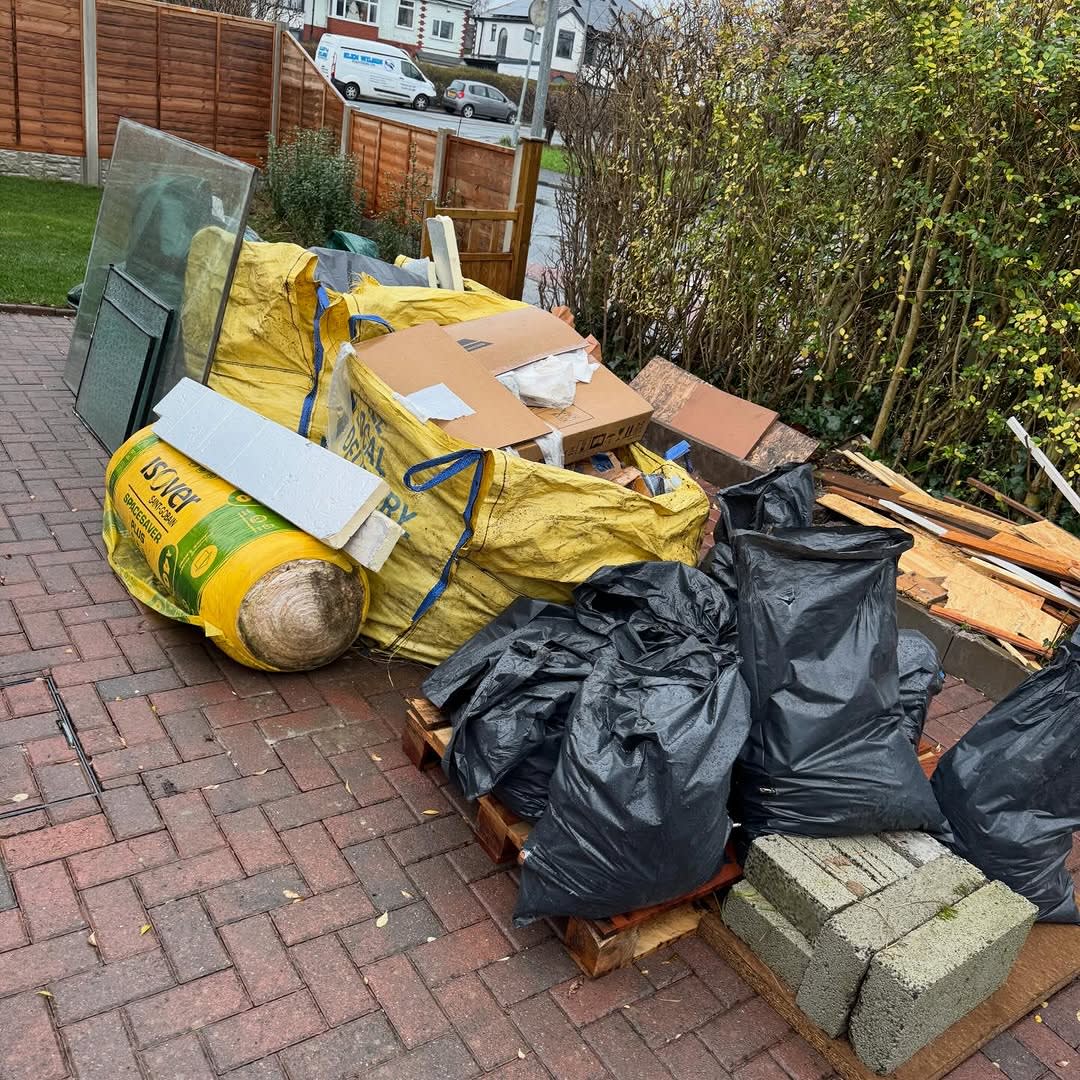 Builders rubble on a driveway awaiting collection