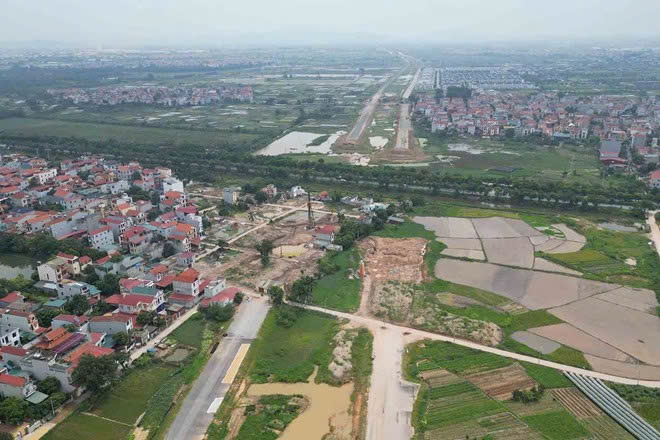 Hà Nội lùi tiến độ GPMB Vành đai 4 đến hết quý II/2026- Ảnh 1. Hà Nội lùi tiến độ GPMB Vành đai 4 đến hết quý II/2026- Ảnh 1.