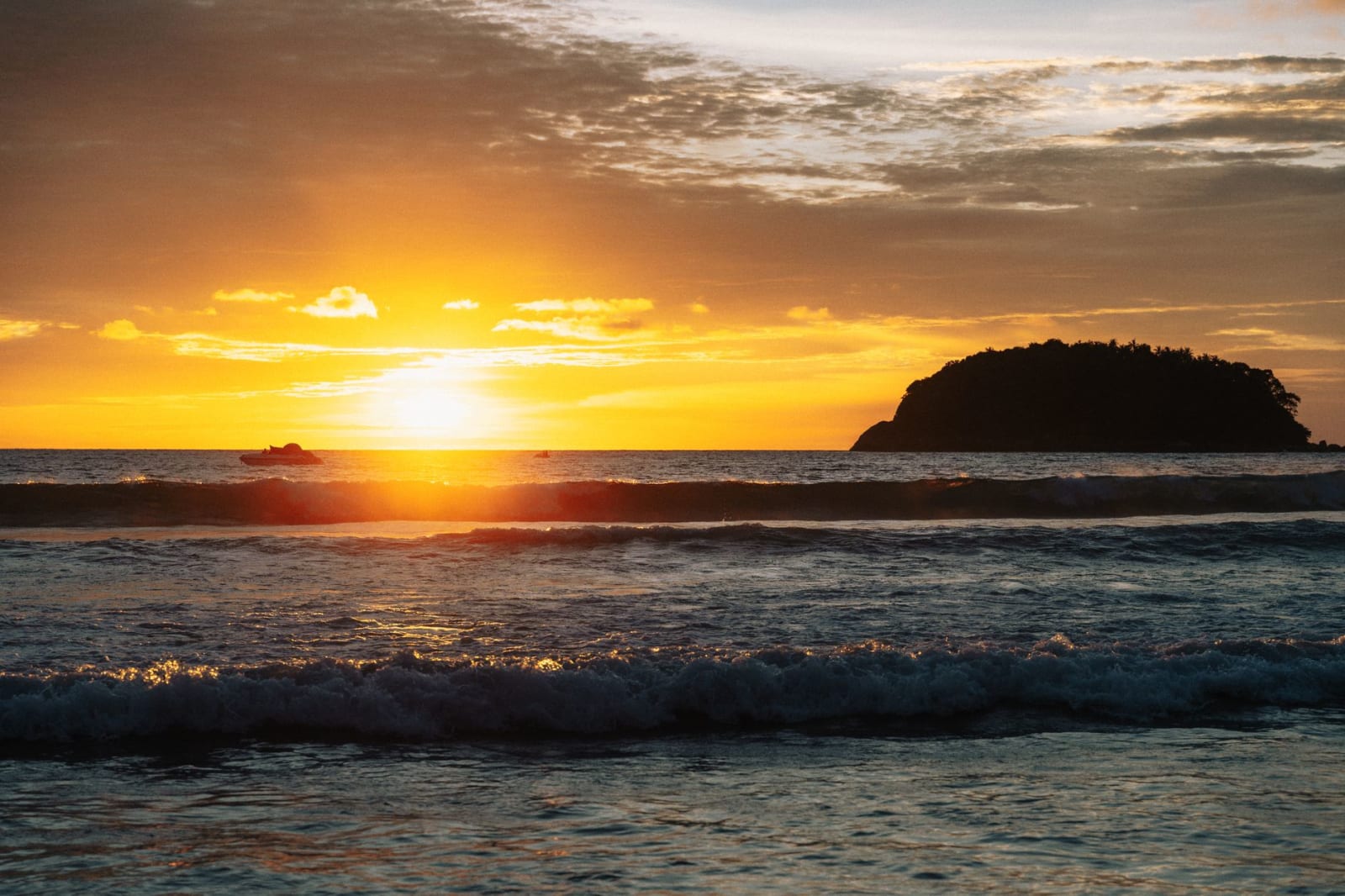 Sunset over the water at Kata Beach