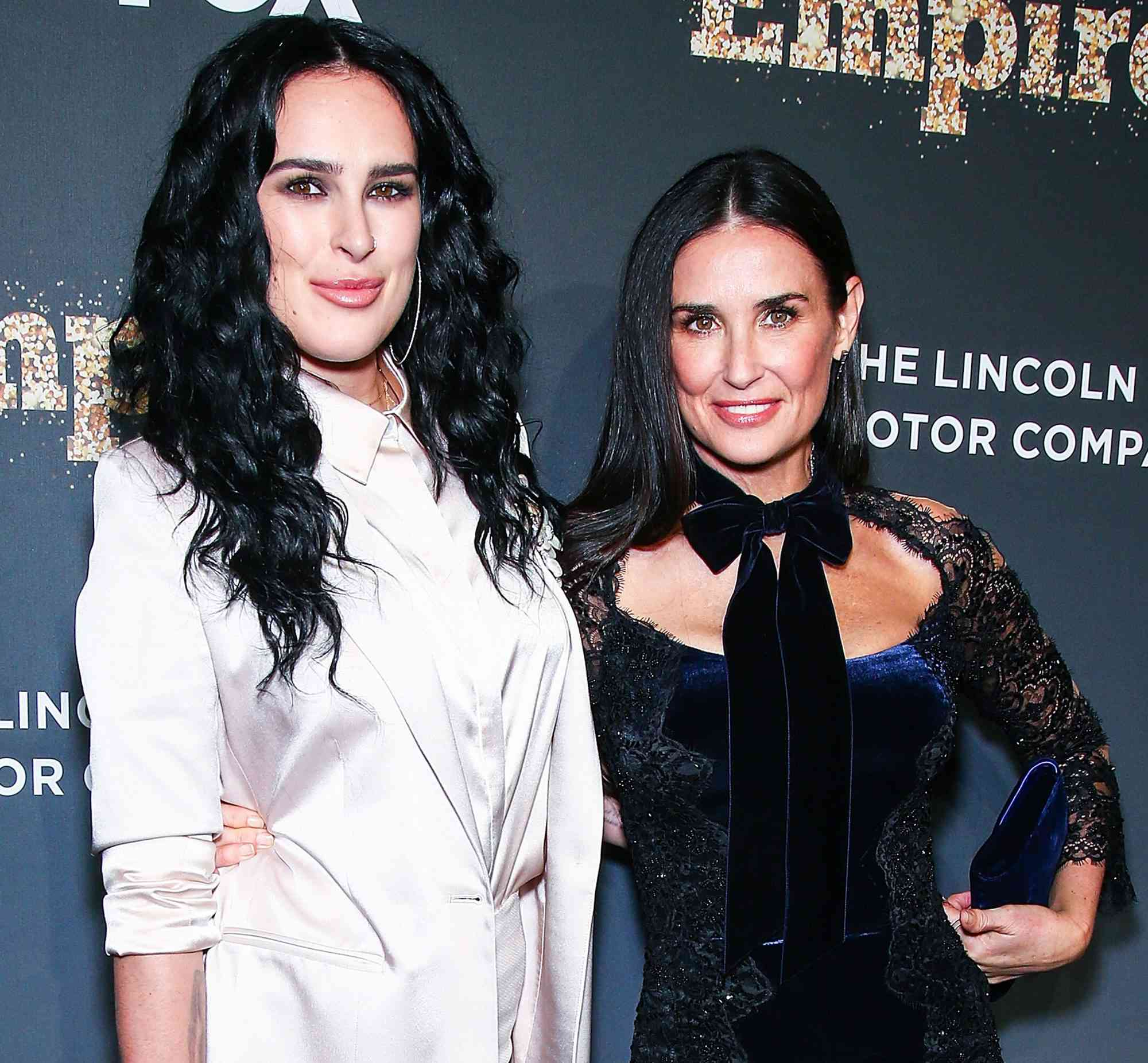 Rumer Willis and Demi Moore posing at an Empire FOX event sponsored by Lincoln Motor Company.