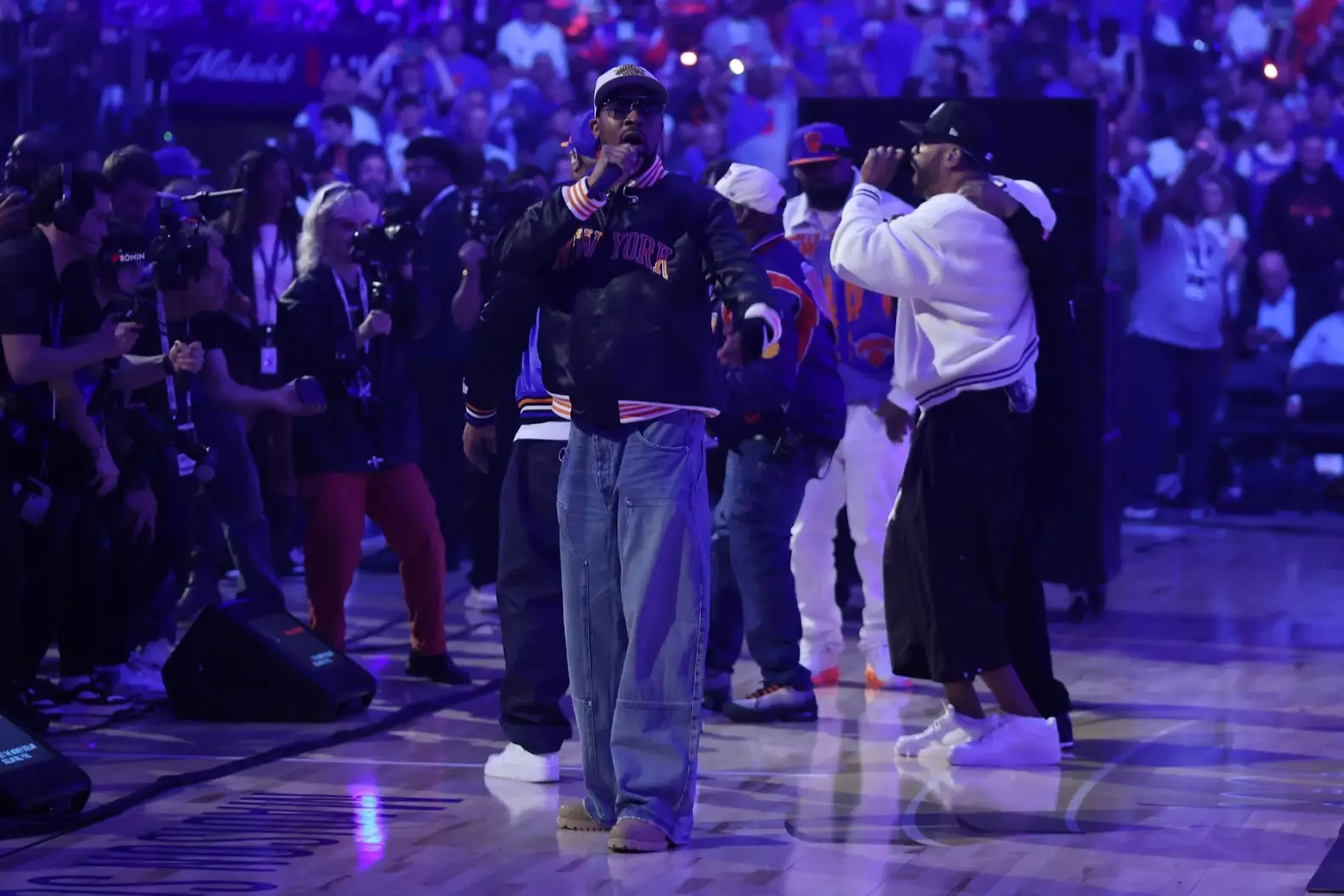 Wu-Tang Clan performing at halftime of Game 4 of the Knicks series on the MSG court.
