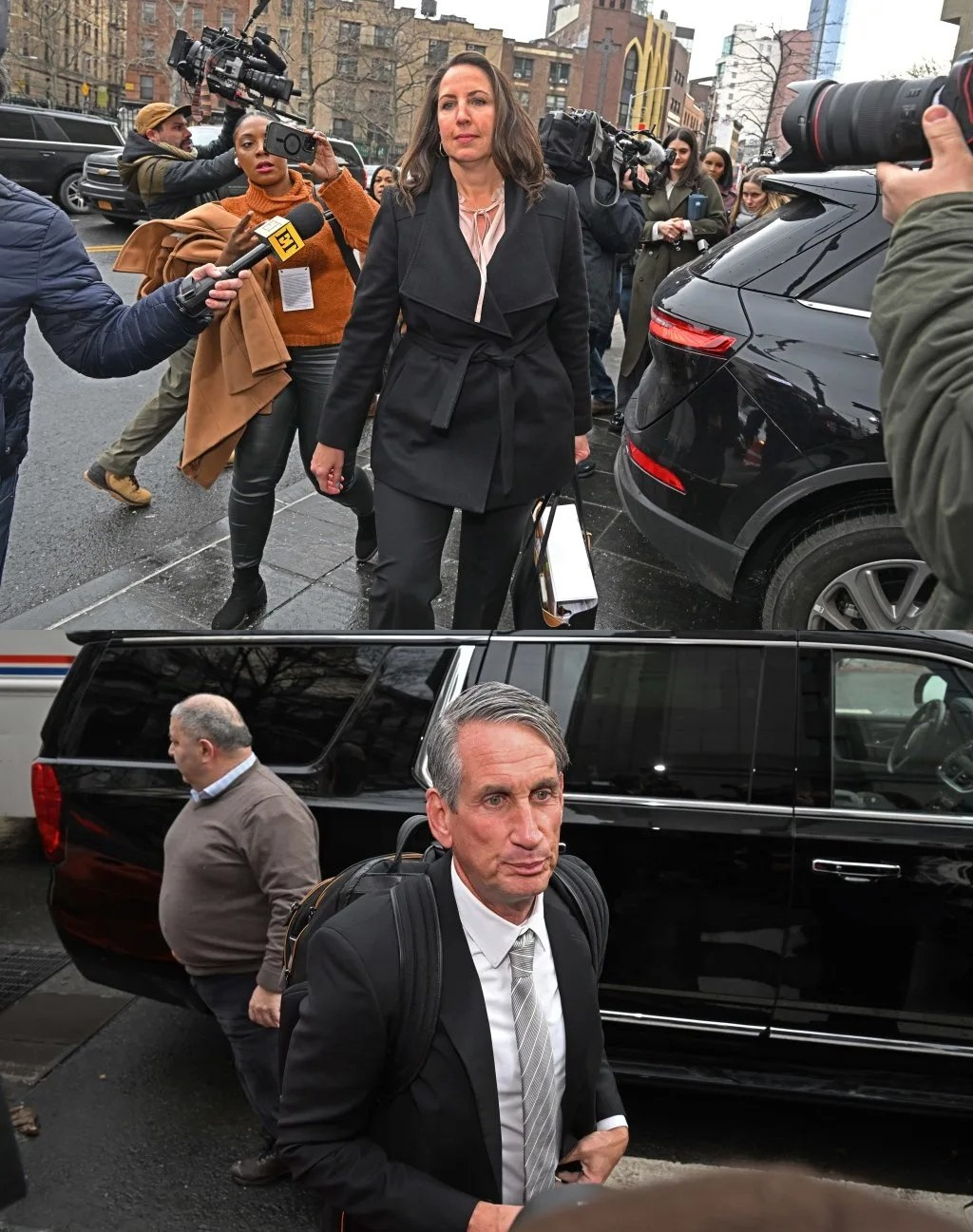 Two lawyers walking separately through busy New York City streets, surrounded by media and parked vehicles.