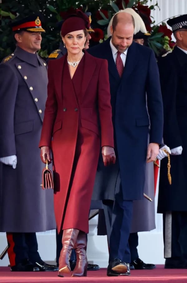 Welcoming the Emir of Qatar in December 2024, the Princess wore a bespoke burgundy Alexander McQueen coat, its sharp lapels a deliberate diplomatic echo of the maroon in the Qatari flag. | Photo: Getty Images
