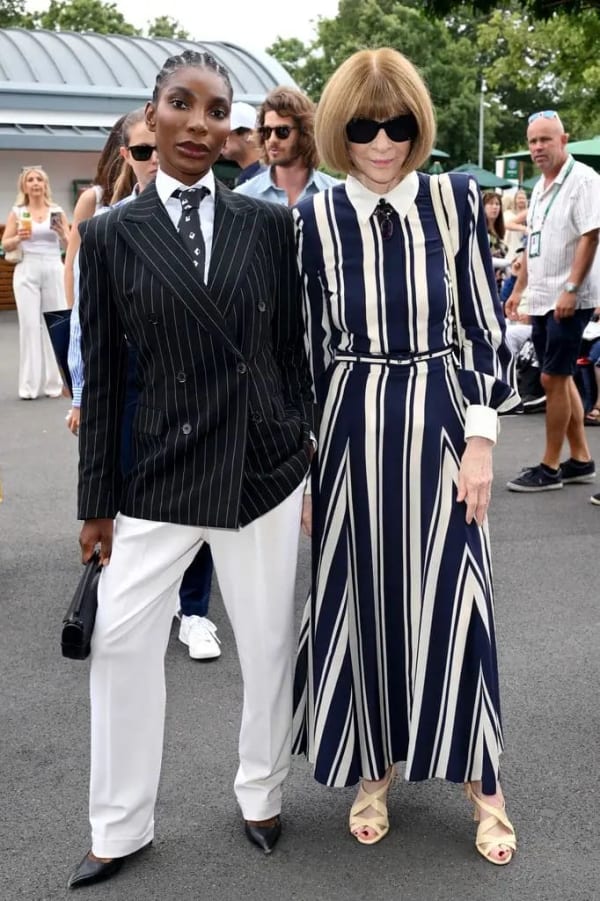 Michaela Coel posed alongside Anna Wintour, each opting for sharply tailored, contrasting looks for the occasion.