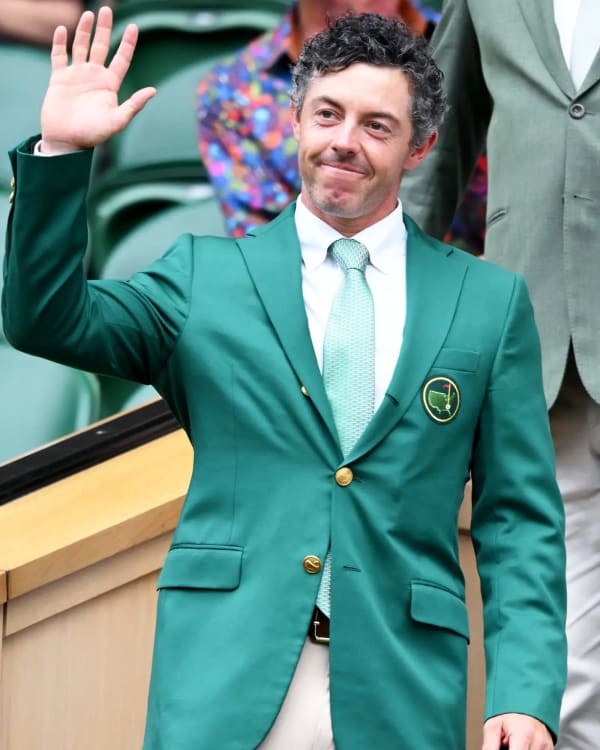 Rory McIlroy donned his Masters green jacket as he and wife Erica joined several Ryder Cup teammates to watch Jannik Sinner's second-round win over Nuno Borges.