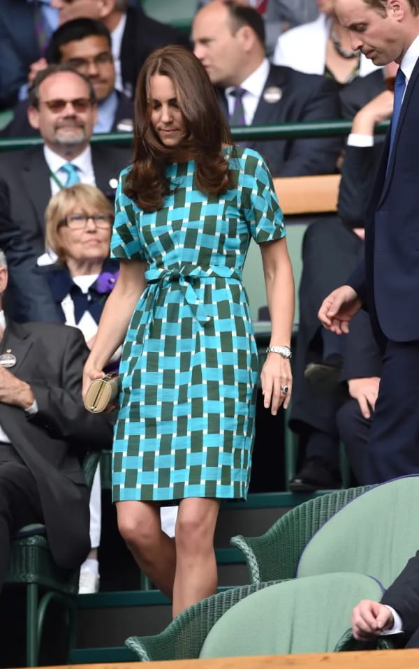 For the 2014 gentlemen's singles final, the then-Duchess chose the Jonathan Saunders 'Evelyn' dress — a textured aqua, forest-green and white basket-weave print with a detachable tie waist, one of her most graphic Wimbledon looks to date. | Photo: WireImage