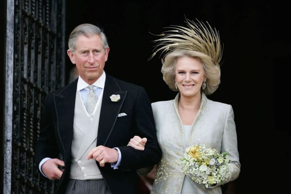 King Charles III and Queen Camilla on their wedding day, April 9, 2005. The couple married in a civil ceremony at Windsor Guildhall, followed by a blessing service at St. George's Chapel, Windsor Castle — one of the most closely watched royal unions in modern British history.