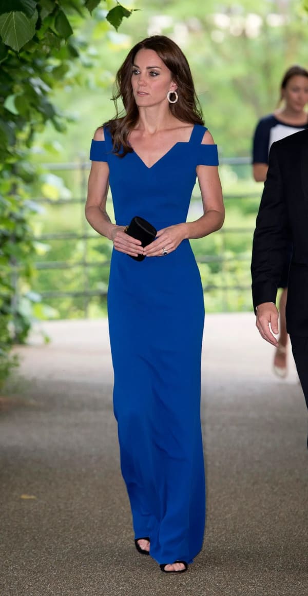 The Princess of Wales stuns in Roland Mouret's royal blue cold-shoulder "Nansen" gown at the SportsAid SportsBall, held at Kensington Palace in June 2016.