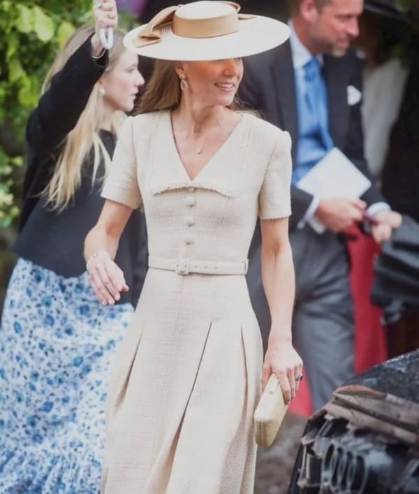 The Princess of Wales looks effortlessly chic in a Roland Mouret Folded Collar Belted Bouclé dress and a Jane Taylor London boater hat at Peter Phillips and Harriet Sperling's wedding in Kemble, Gloucestershire, on 6th June 2026.