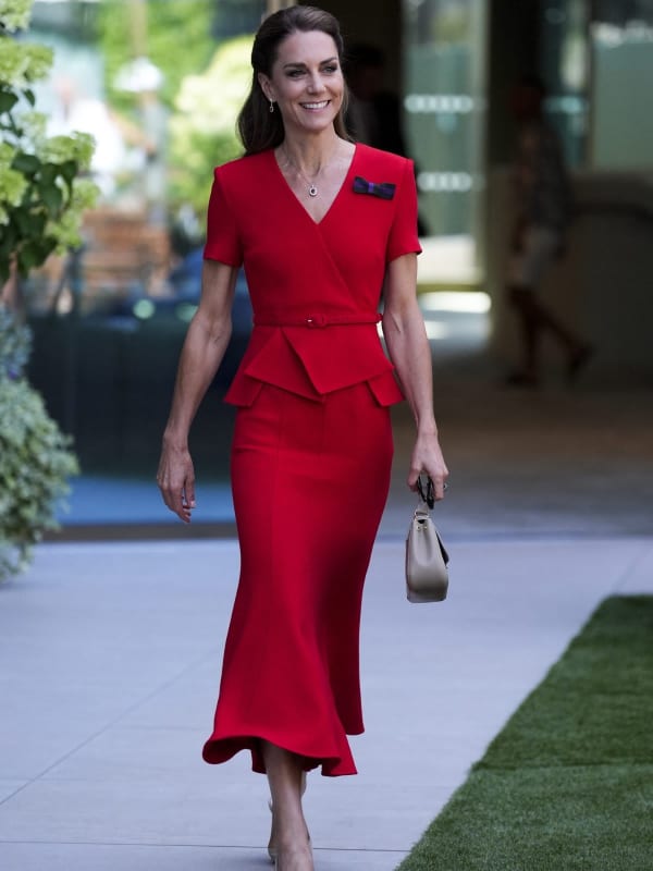 The Princess of Wales turns heads at the Wimbledon Ladies' Singles Final on 11 July 2026, radiant in Roland Mouret's crimson Wool Origami Peplum Drape Dress paired with a taupe Tusting bag.