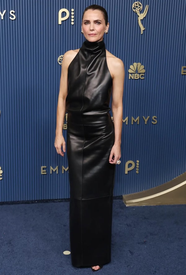The Diplomat star Keri Russell, nominated for Outstanding Lead Actress in a Drama Series for her work on Netflix's political thriller, brought serious edge to the carpet in a custom backless Khaite leather gown. - Getty Images.