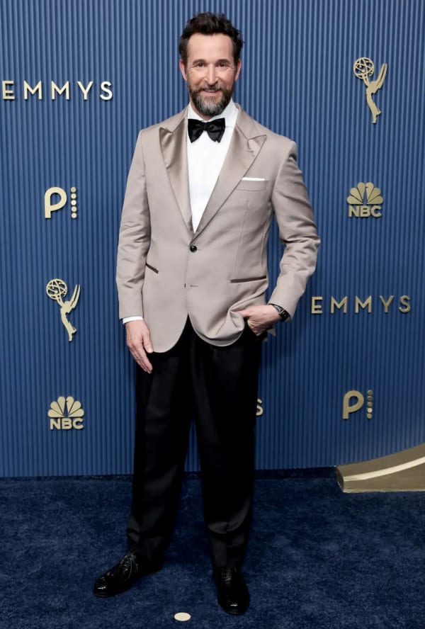 The Pitt nominee Noah Wyle looked dapper as ever in a taupe Brunello Cucinelli tuxedo jacket paired with sleek black pants. - Getty Images.