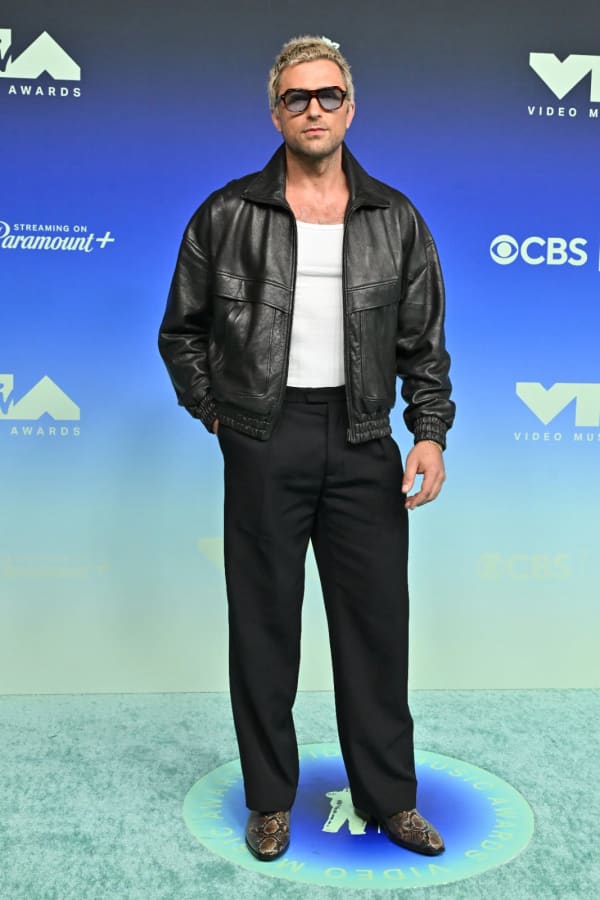 Brandon Sklenar turned heads on the MTV VMAs red carpet at LA's Peacock Theater on 27 September, pairing a Saint Laurent leather bomber and Willy Chavarria trousers with a platinum blond transformation that left fans doing a double take.