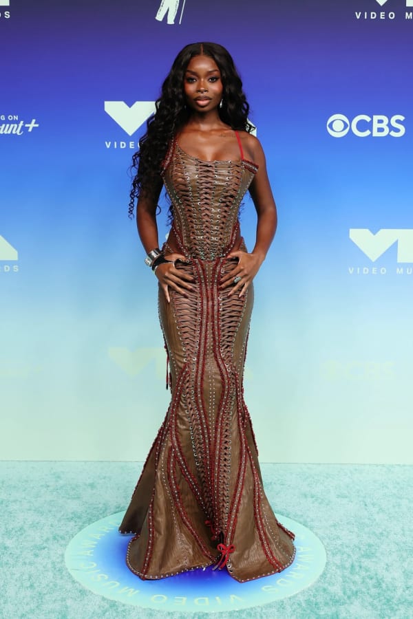 Love Island USA star Olandria Carthen turns heads at the 2026 MTV VMAs in Los Angeles, wearing the ManManSkins Crimson Thorn lace-up corseted mermaid gown crafted from cocoa-brown vegan leather.