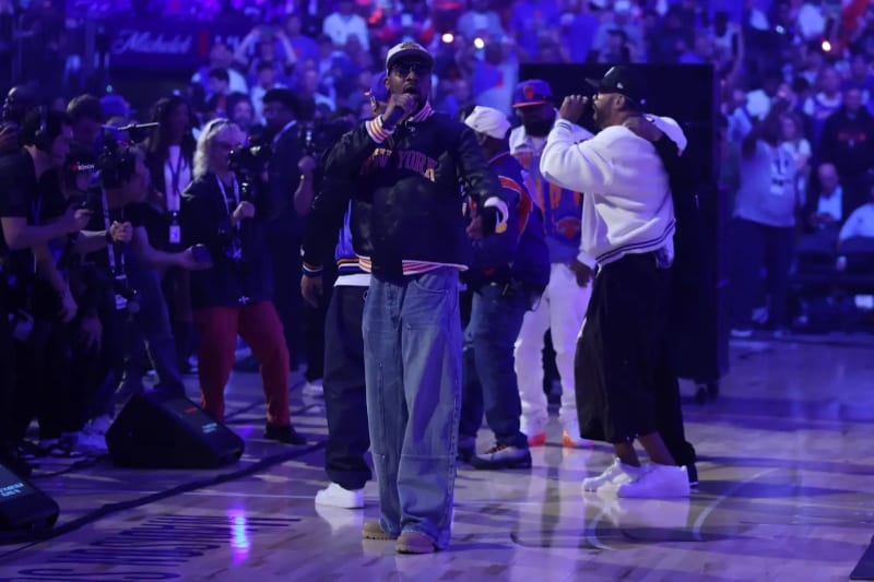 Wu-Tang Clan performing at halftime of Game 4 of the Knicks series on the MSG court.