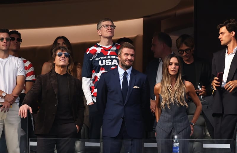 Tom Cruise, David Beckham and Victoria Beckham in a VIP box at the FIFA World Cup.