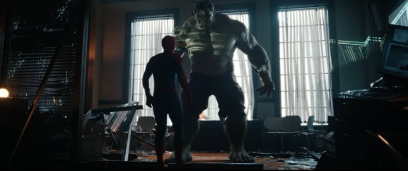 Spider-Man and the Hulk facing off in a destroyed room in a film still from the Spider-Man: Brand New Day trailer.