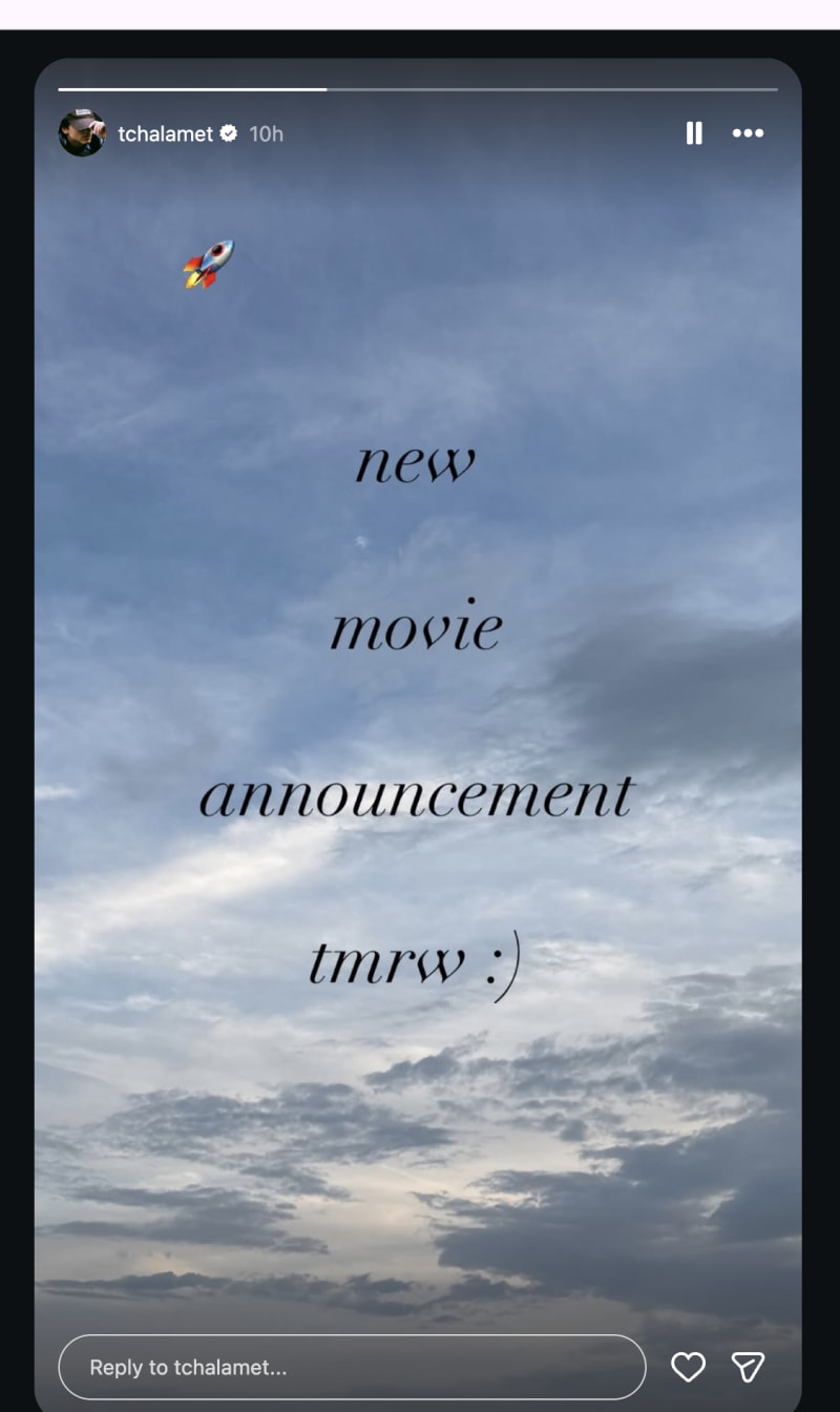 An Instagram Story with a cloudy sky background and the text "new movie announcement tmrw :)" with a rocket emoji, posted by the account tchalamet.