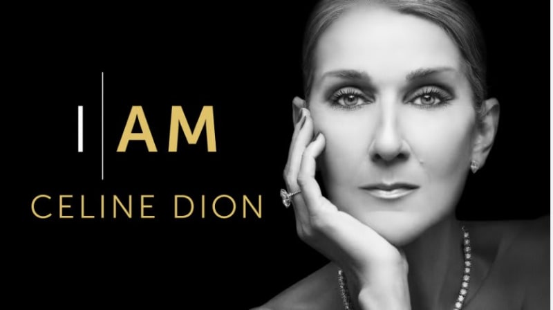 Woman in black-and-white portrait, hand under chin, with gold text reading 'I AM CELINE DION' on black background.