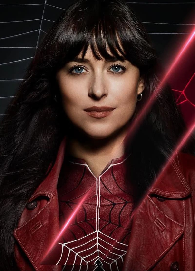 Woman in red leather spider-web costume, dark hair with bangs, dark background.
