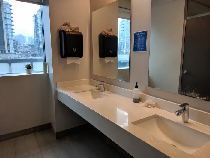 Office restroom before professional cleaning