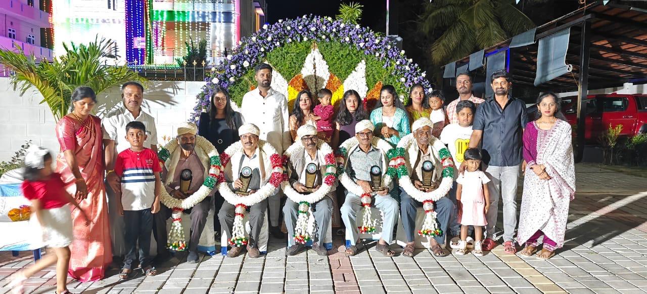 Team photograph of staff, researchers, and Family