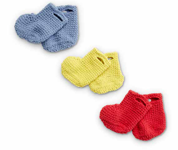 Close-up of baby bootie with strap