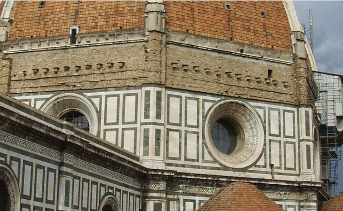 An oculus — a round opening — set into the wall of a domed church.
