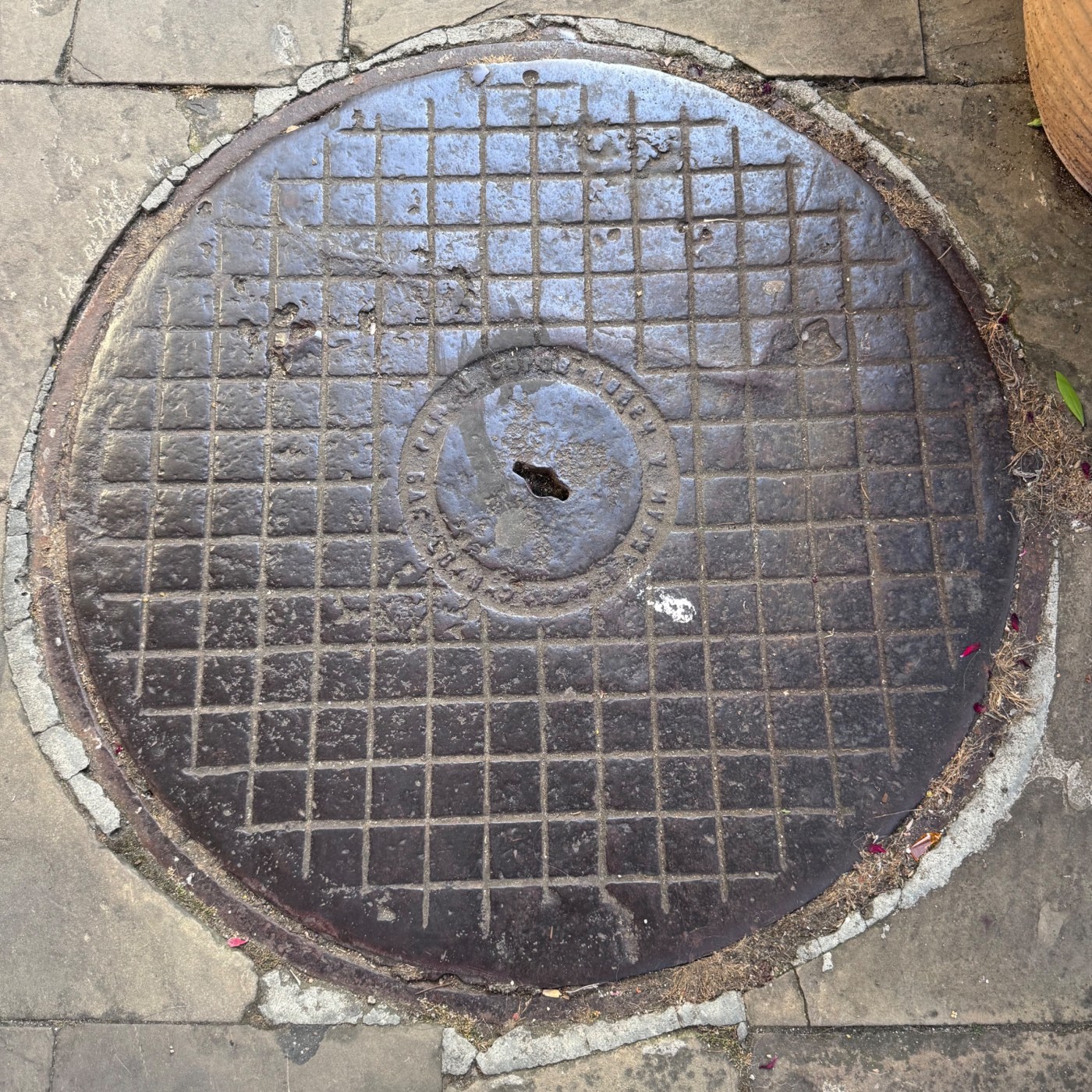The dark, heavily textured surface of this circular specimen, meticulously documented by the Institut Lidologie, feature in Nesebar, Burgas, Bulgaria — CoverSpot
