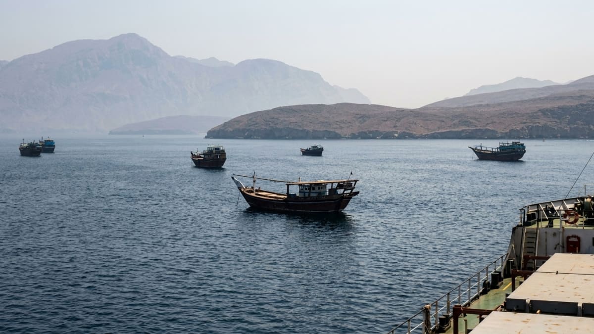 Vessels anchored in the hazy Strait of Hormuz