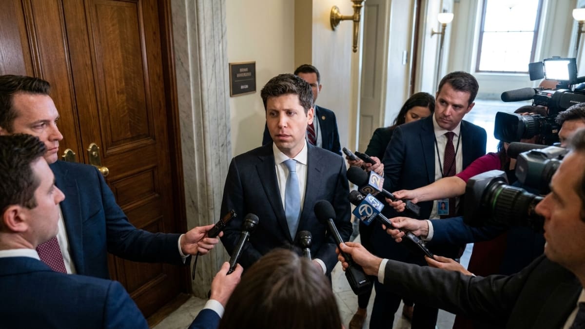 OpenAI chief executive Sam Altman speaking to reporters in a corridor of the US Capitol