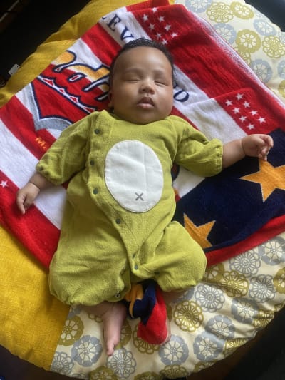 Taking nap with dinosaur suits!