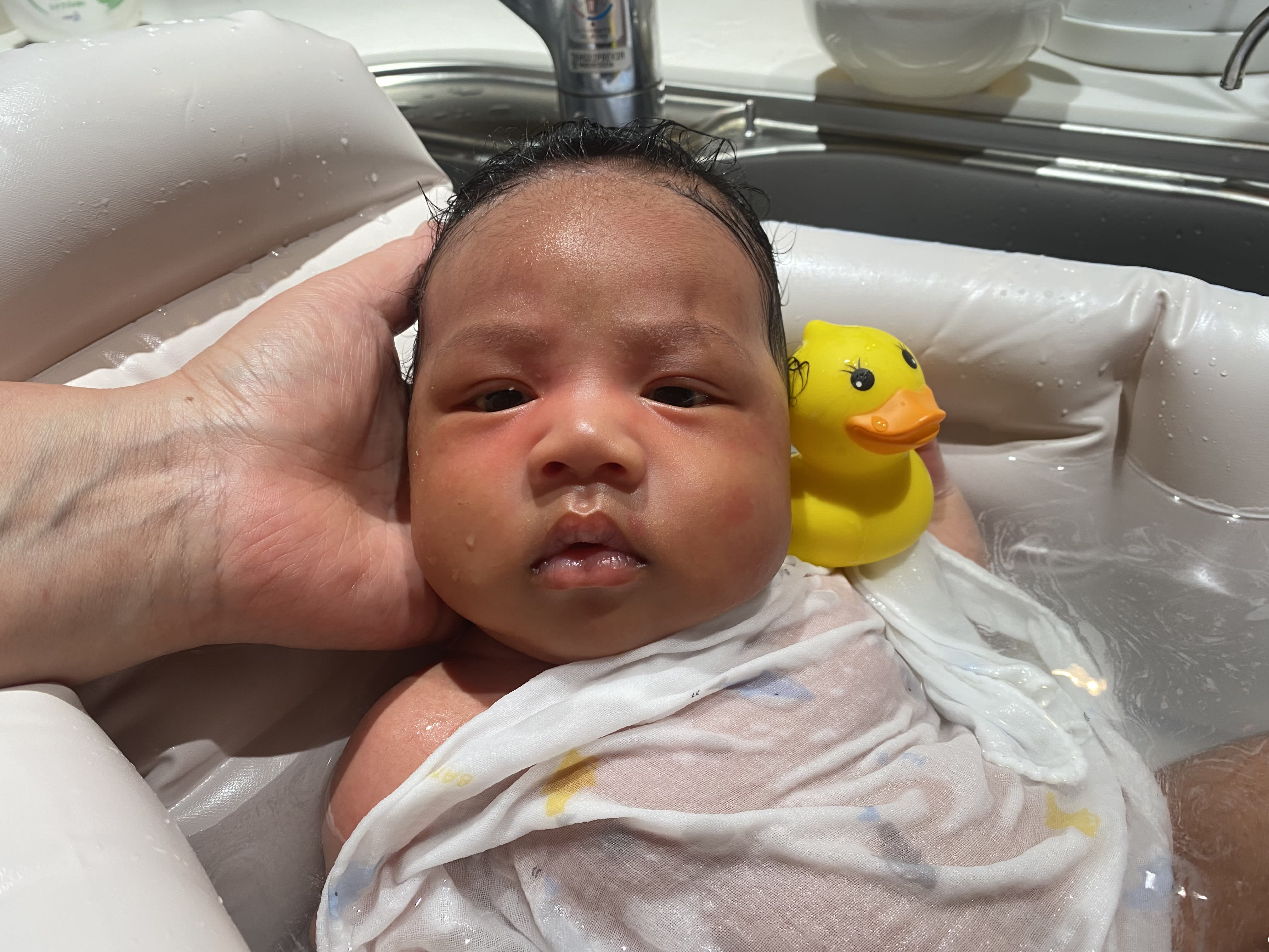 Bath time with a duck!