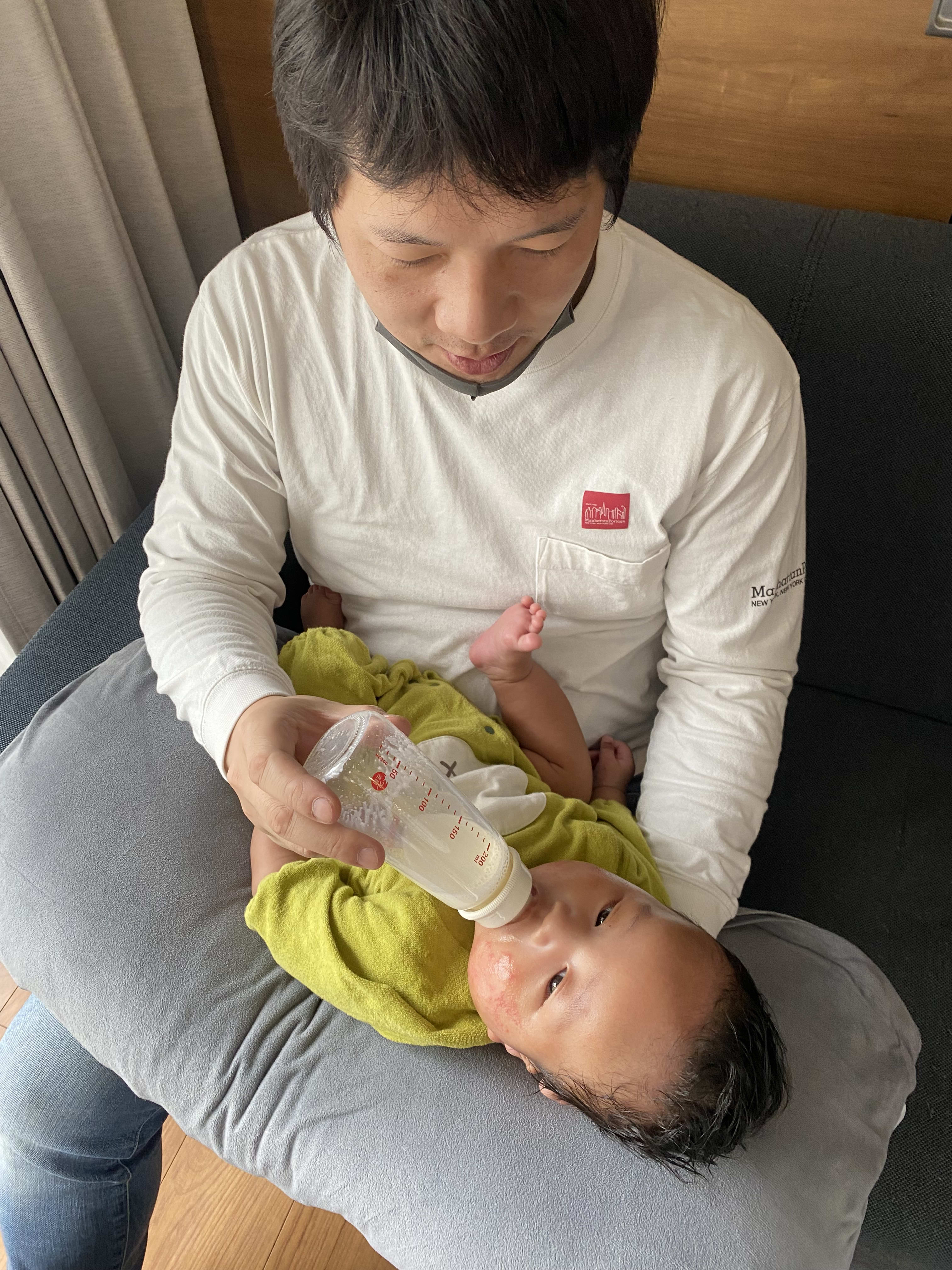 Uncle held him for his first time!