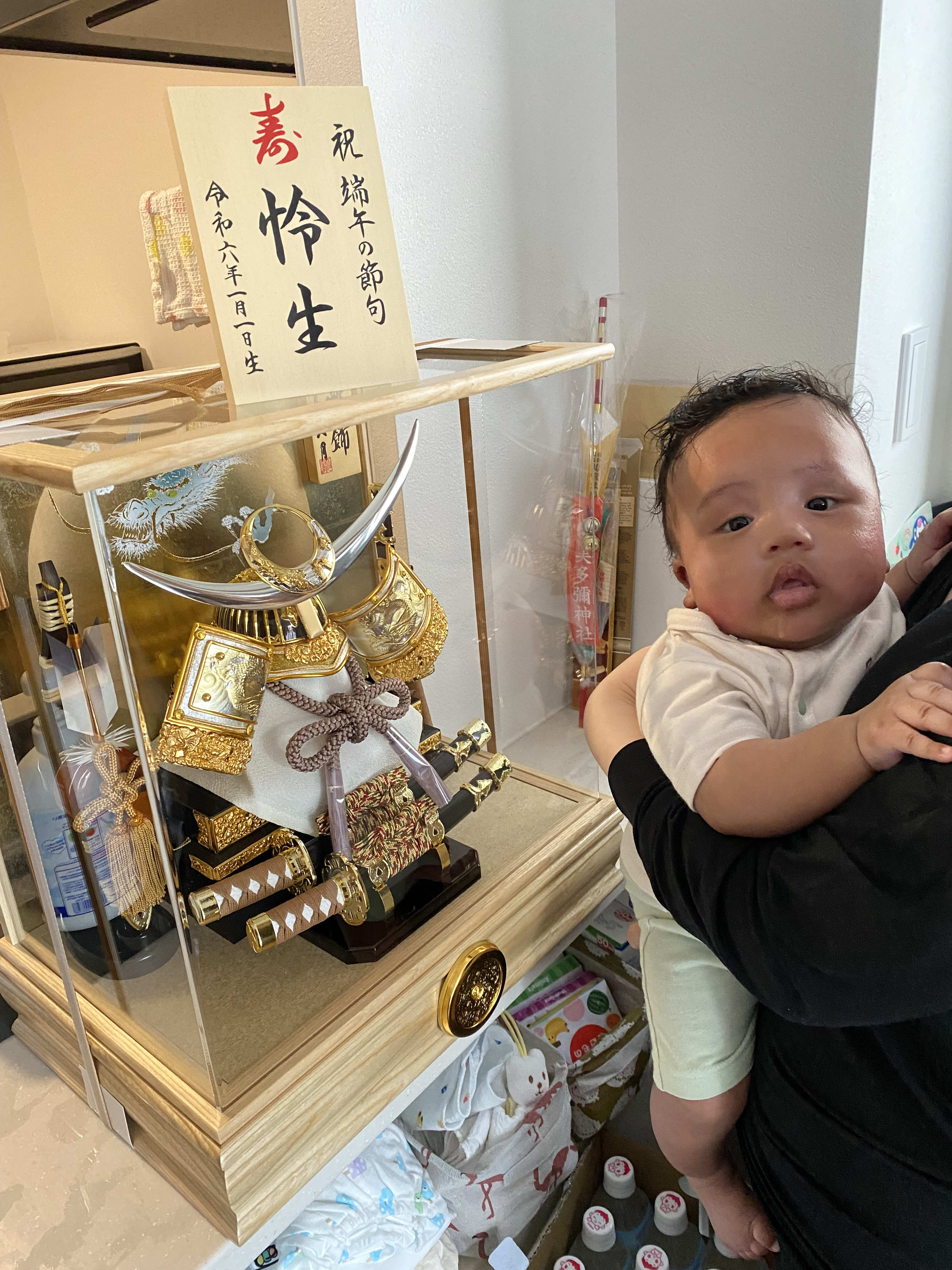 Grandpa gave a May doll for Leo!
