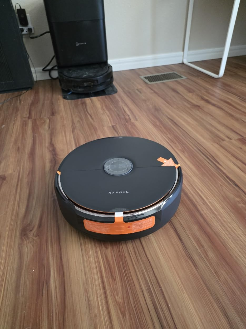 Narwal Flow 2 unboxed on floor with shipping tape