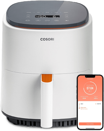 Cosori Lite 4.0-quart smart air fryer in sage green on a compact kitchen counter