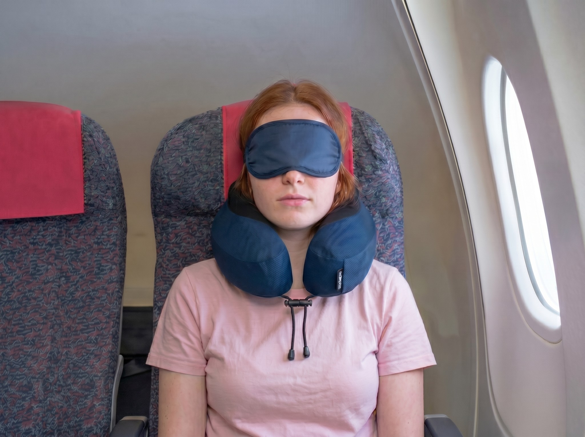 A selection of travel neck pillows laid out for comparison on a neutral surface