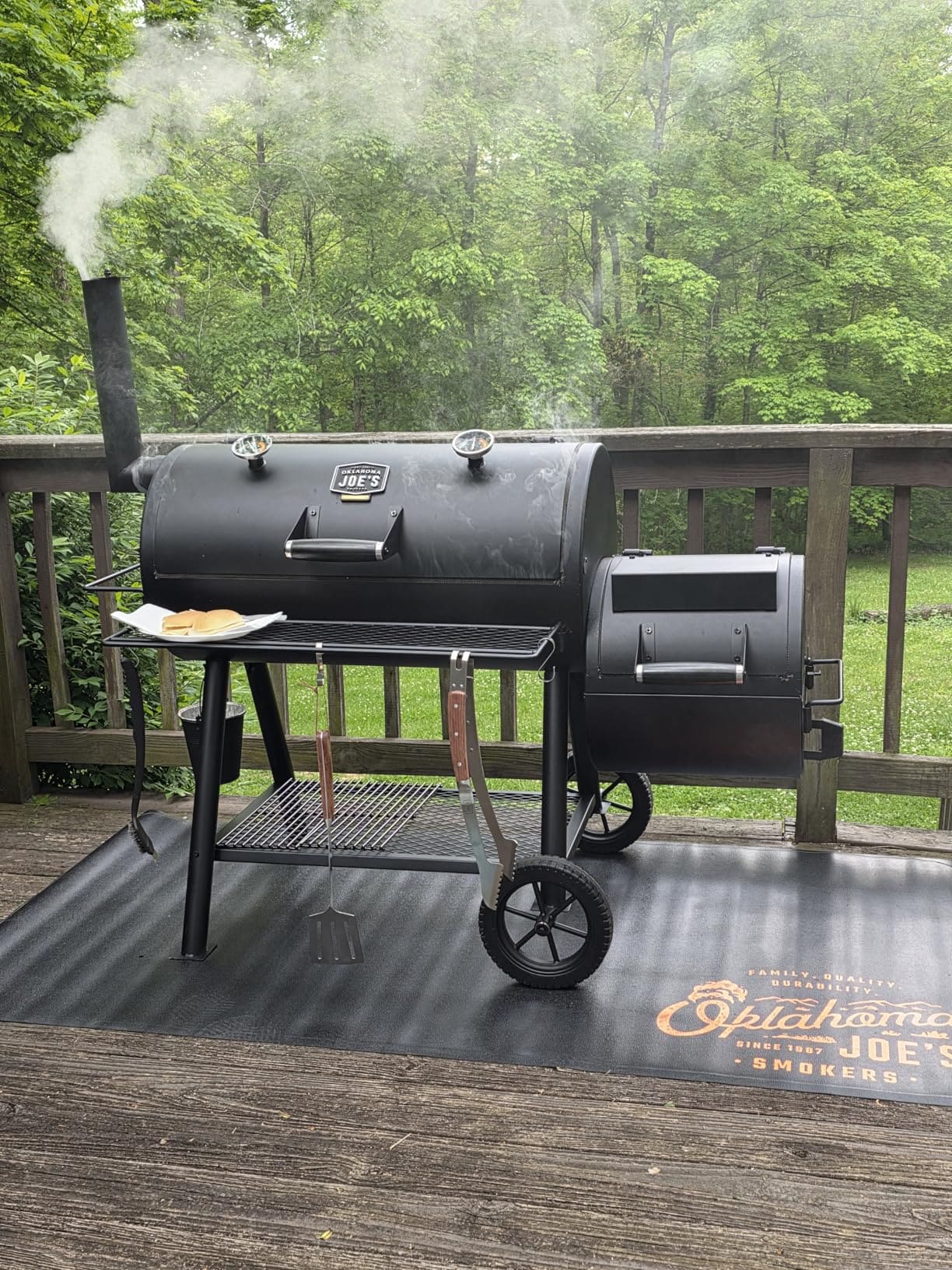 Oklahoma Joe's Highland offset smoker showing firebox and cooking chamber detail